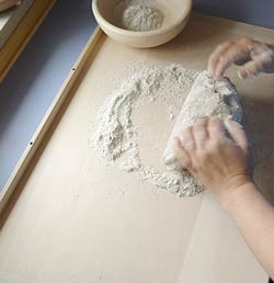 Kneading dough on the baking board